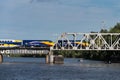 MINNEAPOLIS, MN Ã¢â¬â SEPTEMBER 9, 2018: Northstar Commuter Train moves east across bridge over Mississippi river. The Northstar